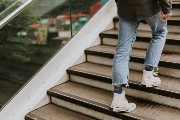 istock Person walking upstairs 2157532887