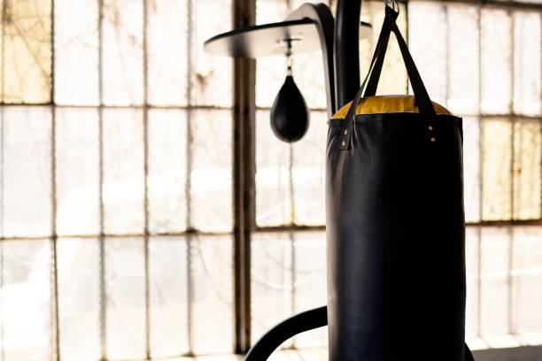 istock Punching bag hanging by the window 2157533317