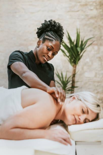 istock Woman enjoying back massage therapy, self-care concept 2157533987
