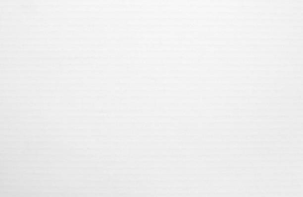 istock White cardboard sheet texture background, detail of recycle paper box pattern. 2157534002