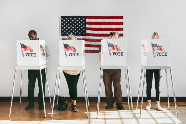 istock American at a polling booth 2157540140