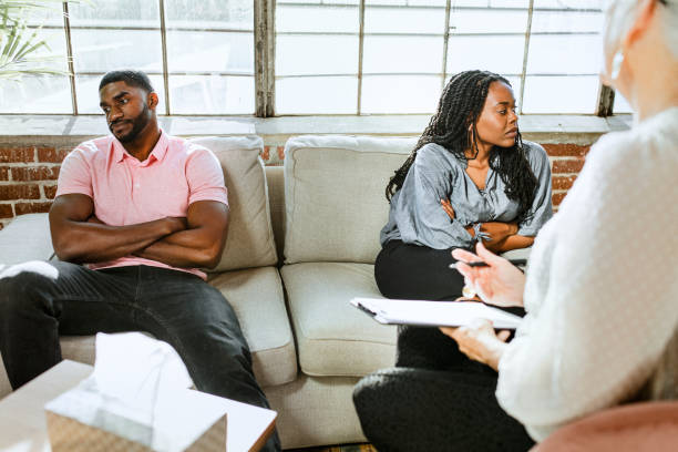 istock Black couple having a marriage counseling with therapist 2157540673