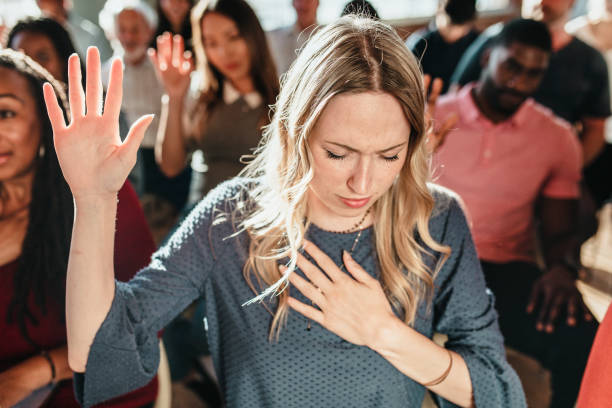istock White woman raising her hand 2157540723