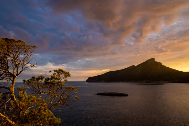 Sunset view of Sa Dragonera Island from Punta Blanca viewpoint, in Sant Elm, Andratx, Majorca, Balearic Islands, Spain