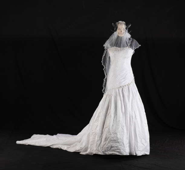 halloween white wedding dress with a skull on a black background