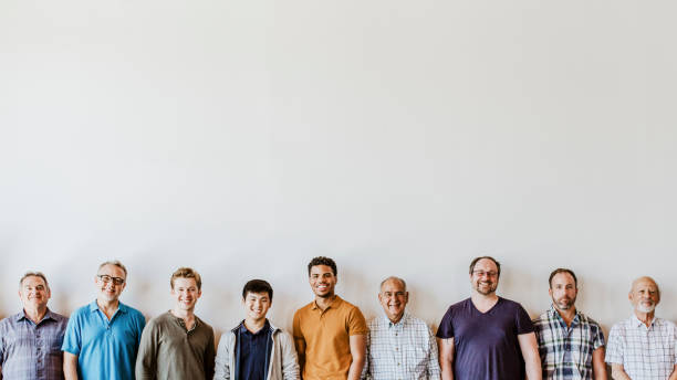 Cheerful diverse men standing in a line background