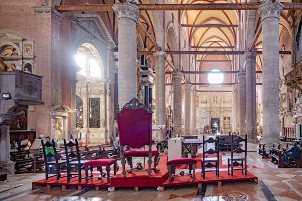Basilica dei Santi Giovanni e Paolo, Venice, Italy - June 1th 2024:  Cathedra arrangement in the basilica which has a long history, the building where completed in 1430 and has since in periods been the burial place for the dodges of Venezia