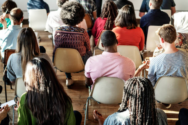 istock Cheerful people sitting in seminar 2157543456