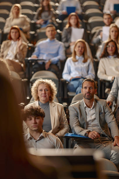 istock Business people attending an education event in convention center. 2157545341
