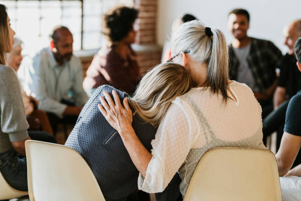 istock People support each other in a rehab session 2157545770
