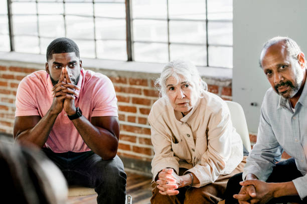 istock People listening to a speaker in a rehab session 2157545775