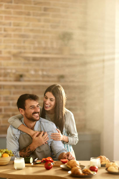 istock Young happy couple enjoying in the kitchen. 2157546052