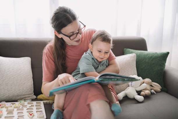 istock Joyful reading moments with mom 2157546818
