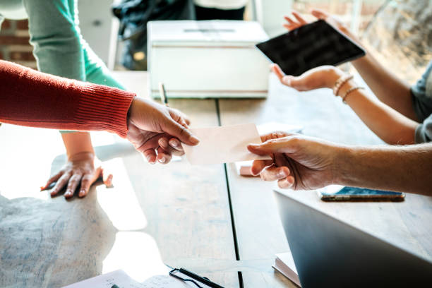 istock People getting a ballot at a polling place 2157547059