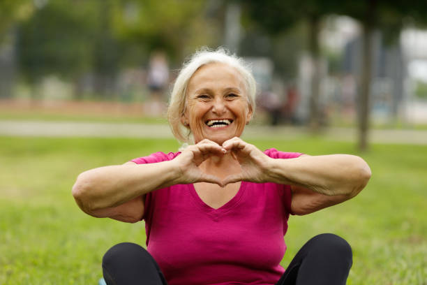 istock Active senior woman making a heart with her hands 2157548982