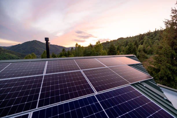 istock Rooftop with solar panels on house in mountains, 2157549323