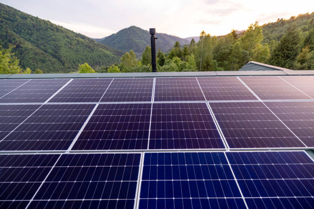 istock Rooftop with solar panels on house in mountains, 2157549421