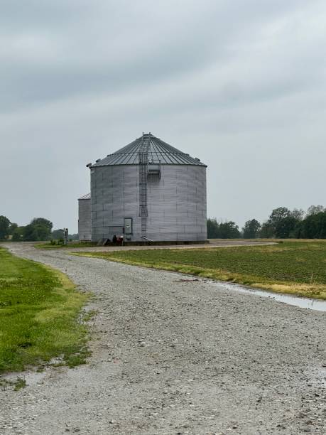 istock Silo on gravel road on cloudy day. 2157549725