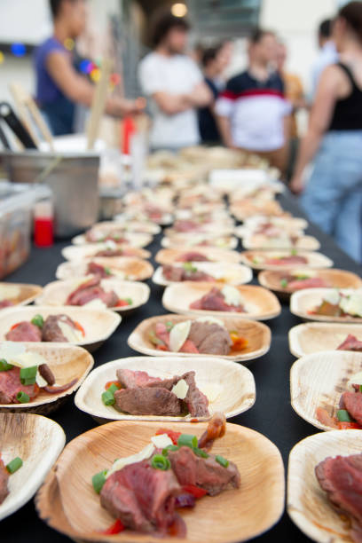 individual dishes prepared by a caterer for a corporate event