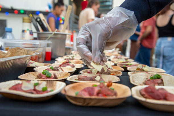 istock caterer preparing individual dishes for a corporate event 2157550213