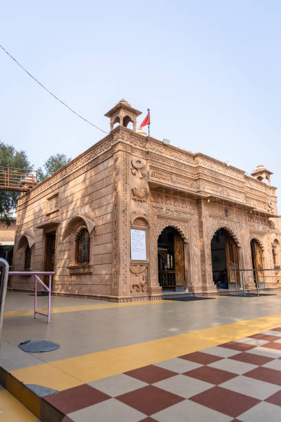 istock ancient hindu temple made of red stone at day from different angle 2157551764