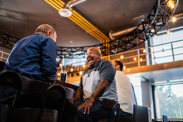 istock Senior friends talking on the bar 2157552032