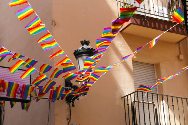 istock Streets and facades adorned with rainbow flags in Benidorm 2157552469