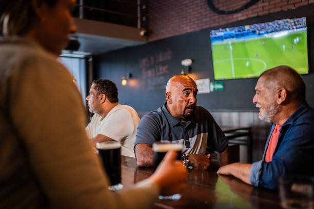 istock Senior friends talking on the bar 2157552503