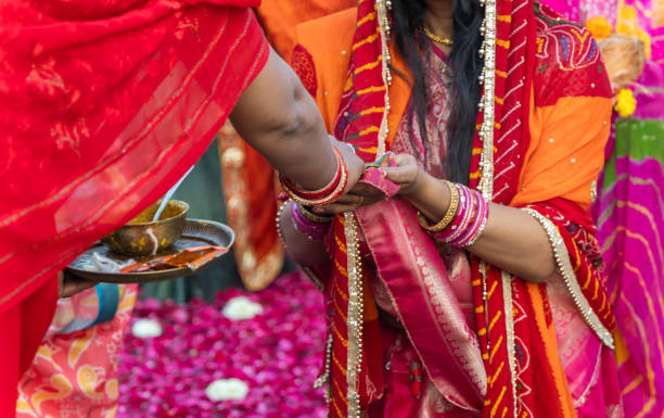istock indian devotee doing holy rituals at chhath festival at morning 2157552554