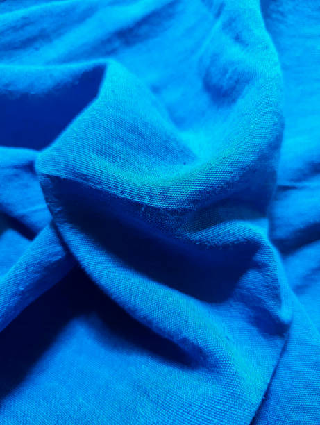 istock Blue clothing fabric texture or sports cloth or thread closeup textile background. 2157557953