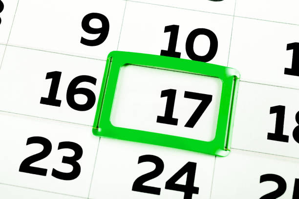White calendar sheet with the black number seventeen marked in a green rectangle frame. Feast of March 17 St. Patricks Day, Ireland. Holiday. Close-up of today. Days. Schedule of events and agenda.
