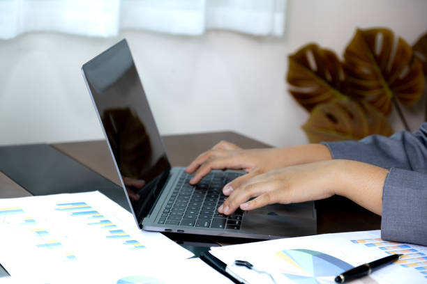 istock Businesswomen bookkeeper hand use laptop analysis the graph for Setting challenging business goals and ready to achieve target at home office 2157561952