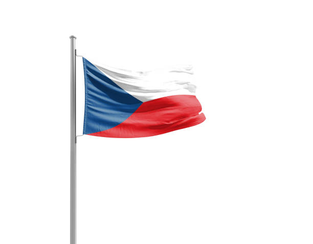 The national flag of the Netherlands waving on a tall flagpole against a clear blue sky with scattered clouds. The red, white, and blue horizontal stripes symbolize Dutch identity, culture, and pride.