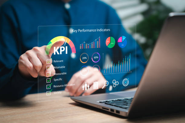 istock KPI, Key Performance Indicator business analysis, Goal setting concept, Businesswomen mark important topics KPI and show KPI dashboard on virtual screen Analyze graphs efficiently, Business target 2157568873