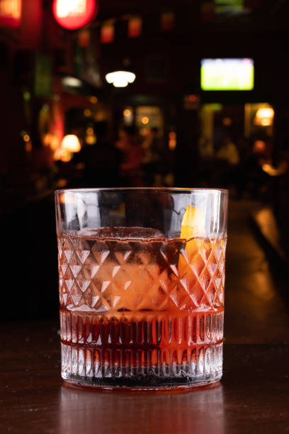 istock campari negroni on blurred pub background 2157571453
