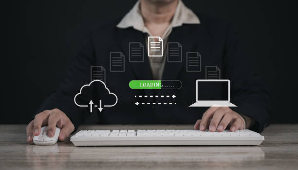 istock Encryption with file transfer concept : Business man use laptop for remote and download or upload folder document picture by internet connection with full access to remote files.. 2157574765