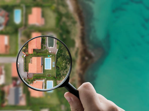 istock Focusing on houses with pools by the sea 2157577368