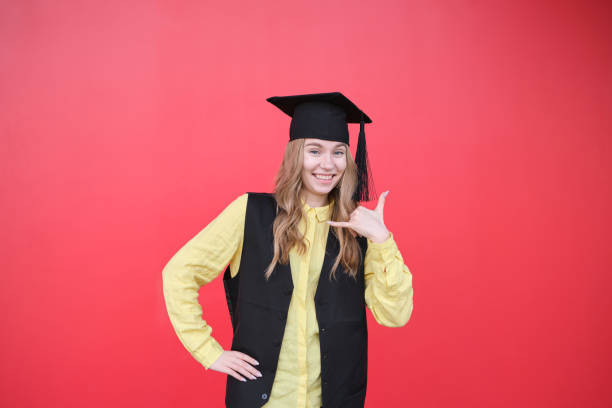 Happy woman on her graduation day . Education and people.