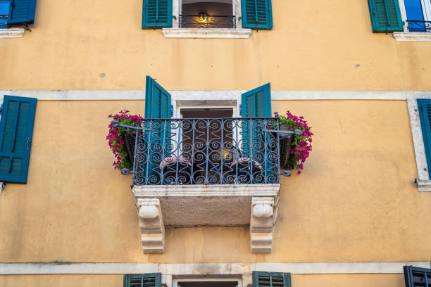 istock Small romantic balcony with beautiful flowers 2157578824