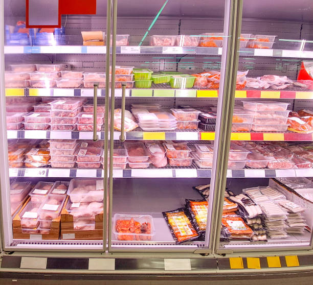 istock meat on a store shelf, refrigerator in a supermarket 2157579427