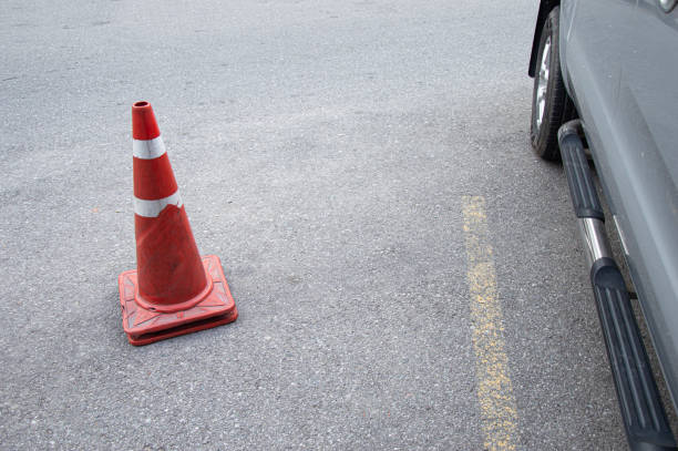 istock Traffic cones, in working condition, placed on the road surface. 2157581472