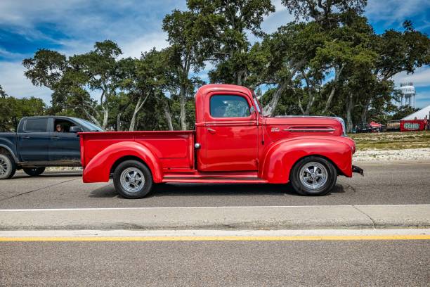 Gulfport, MS - October 07, 2023: Wide angle side view of a 1947 Ford Jailbar Pickup Truck at a local car show.