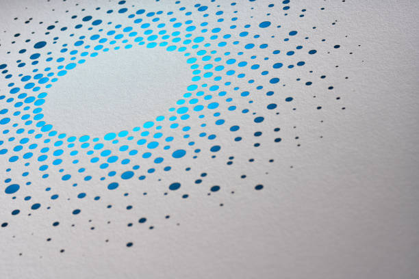 istock Radiant circular pattern of blue perforated dots on white background creating a luminous halo effect 2157582505