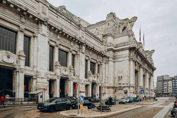 Milano Centrale - The main railway station with a close-up of the facade. It was officially inaugurated in 1931 to replace the old central station (built 1864). Captured during a cloudy day in winter season.
