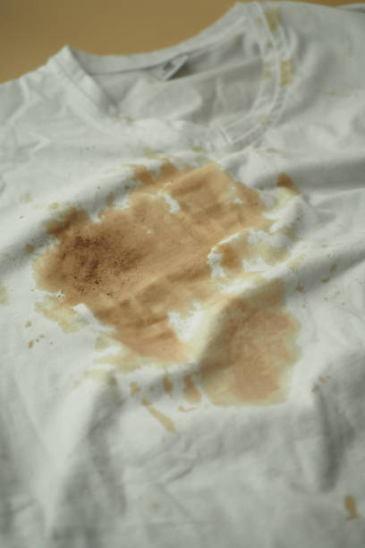 istock spilled coffee on a white shirt 2157585789