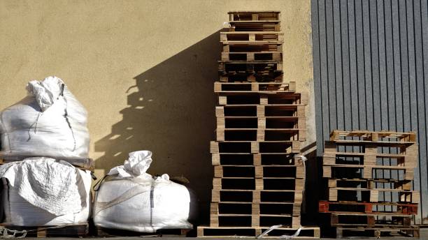 istock wooden pallets and stacked goods 2157591461