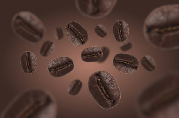 istock Roasted coffee beans levitate on a brown background, motion dynamics 2157595579