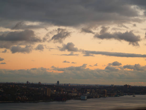 panoramic view of the hudson river skyline at sunset over northeastern new jersey and downstate new york