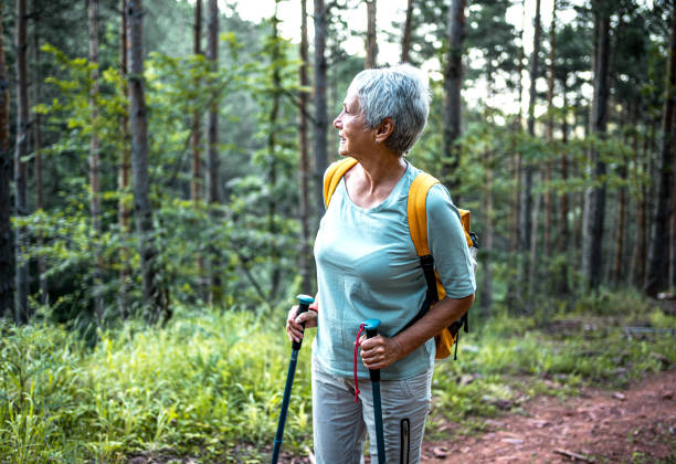 istock Senior woman on hiking in the forest 2157601241