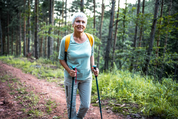 istock Senior woman on hiking in the forest 2157601501